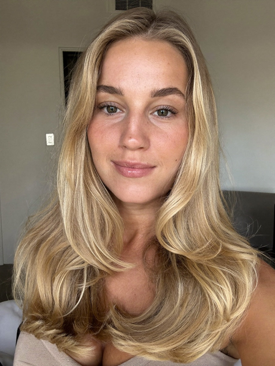 Woman with long blonde hair photographed in natural light